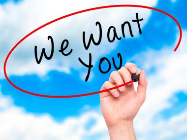 Man Hand writing We Want You with black marker on visual screen