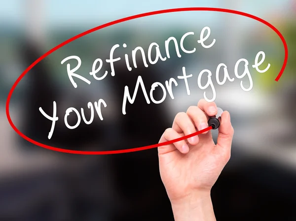 Adam el Your Mortgage Refinance siyah kalemi ile VI üzerinde yazma. — Stok fotoğraf