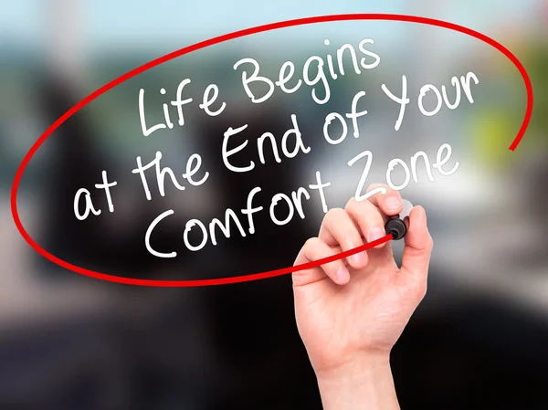 Man Hand writing Life Begins at the End of Your Comfort Zone wit — 스톡 사진