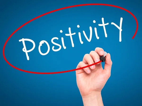 Man Hand writing Positivity with black marker on visual screen — Stock Photo, Image