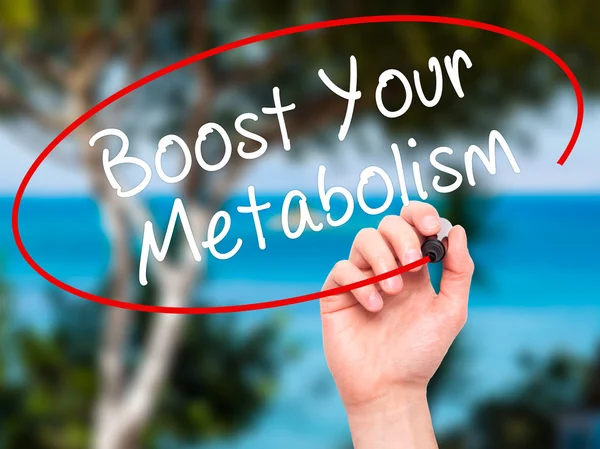 Man Hand writing Boost Your Metabolism with black marker on visu — Stock Photo, Image