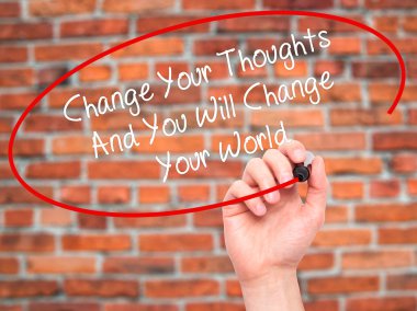 Man Hand writing Change Your Thoughts And You Will Change Your W