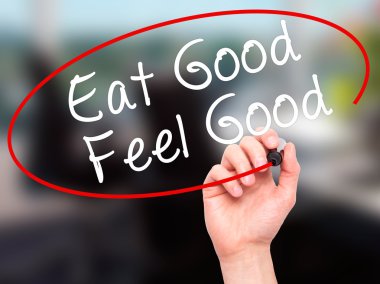 Adam el yemek iyi Feel Good siyah kalemi ile görsel üzerinde yazılı 