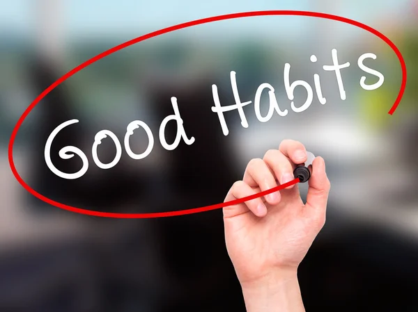 Man Hand writing Good Habits with black marker on visual screen — Stock Photo, Image