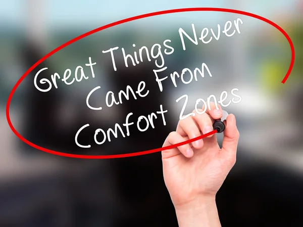 Man Hand writing Great Things Never Came From Comfort Zones with — Stock Photo, Image