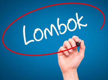 Adam el Lombok siyah kalemi ile görsel ekranda yazma.