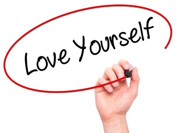 Man Hand writing Love Yourself with black marker on visual scree — Stock Photo, Image
