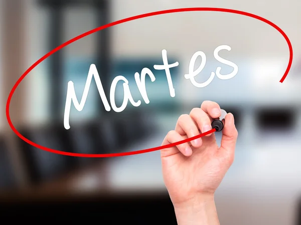 Man Hand writing Martes (Tuesday in Spanish) with black marker o — Stock Photo, Image