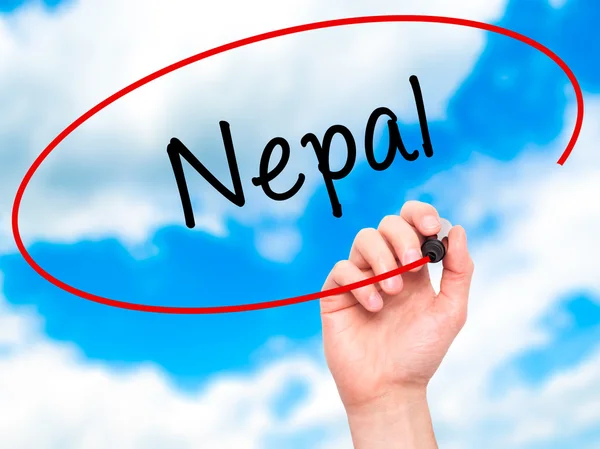 Man Hand schrijven van Nepal met zwarte marker op visuele scherm — Stockfoto