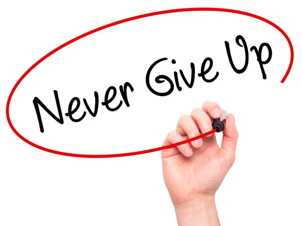 Man Hand writing Never Give Up with black marker on visual scree — Stock Photo, Image