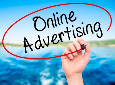 Adam el online reklam ile siyah kalemi görsel üzerinde yazılı. 