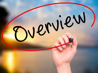 Adam el ile siyah kalemi görsel ekranda yazı Overview