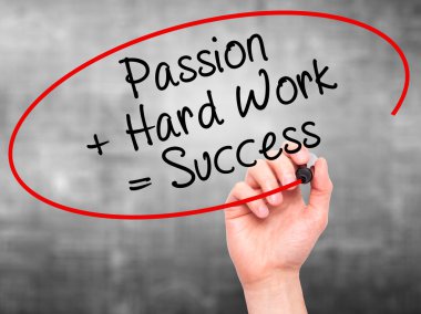 Man Hand writing Passion  Hard Work is Success with black marker
