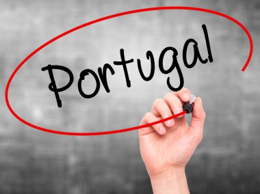 Man Hand writing  Portugal  with black marker on visual screen
