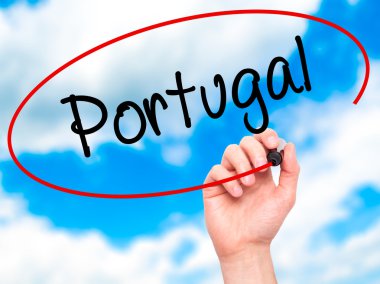 Man Hand writing  Portugal  with black marker on visual screen