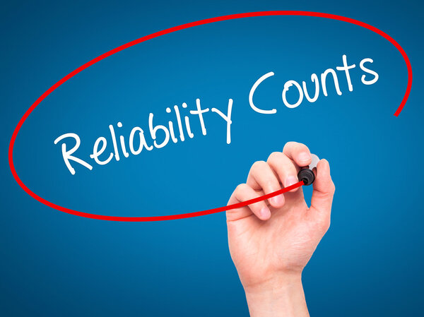 Man Hand writing Reliability Counts with black marker on visual 