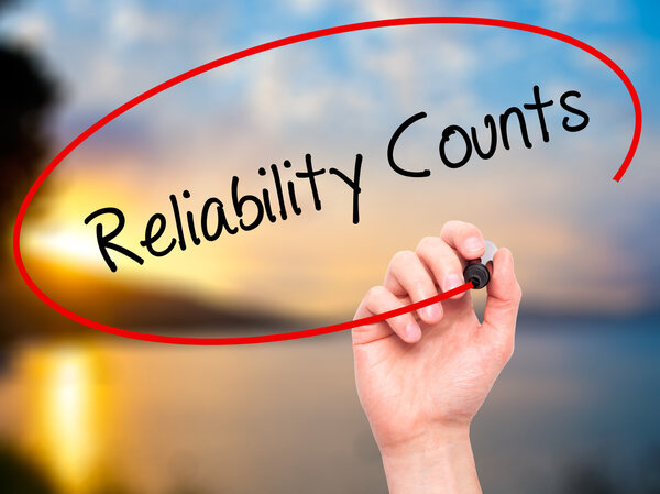Man Hand writing Reliability Counts with black marker on visual 