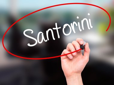 Adam el Santorini siyah kalemi ile görsel ekranda yazma.