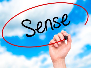 Adam el anlamda siyah kalemi ile görsel ekranda yazma.