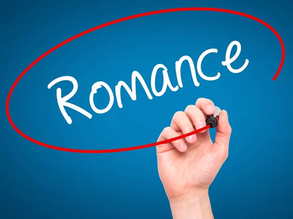 Man Hand writing Romance with black marker on visual screen — Stock Photo, Image