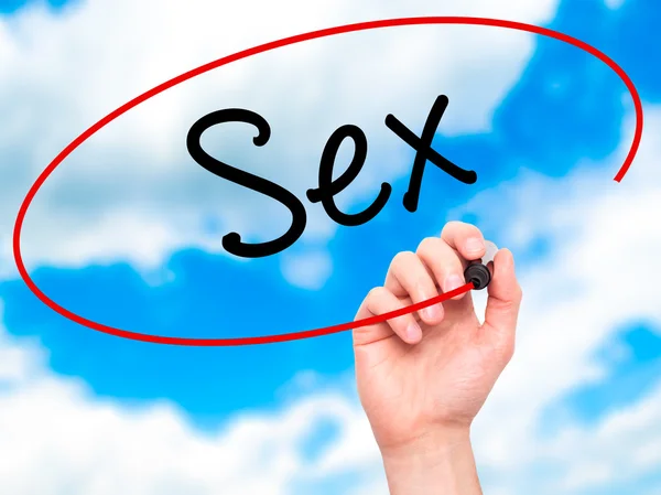 Man Hand schrijven van Sex met zwarte marker op visuele scherm — Stockfoto