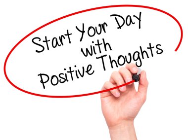 Man Hand writing Start your Dat with Positive Thoughts with blac