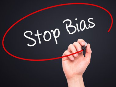 Man Hand writing Stop Bias with black marker on visual screen clipart