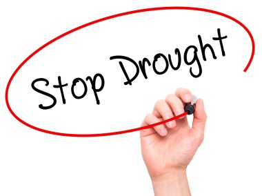 Adam el durdurmak kuraklık ile siyah kalemi görsel dağ eteğindeki taş yığını üzerinde yazma.