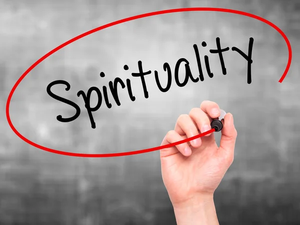 Man Hand writing Spirituality with black marker on visual screen — Stock Photo, Image