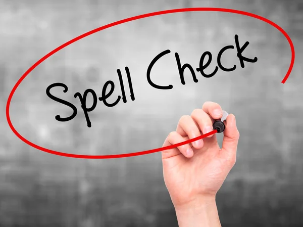 Man Hand writing Spell Check  with black marker on visual screen — Stock Photo, Image