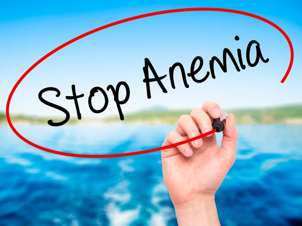 Man Hand writing Stop Anemia with black marker on visual screen — Stock Photo, Image