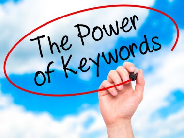 Adam el anahtar güç ile siyah kalemi Görs üzerinde yazma.