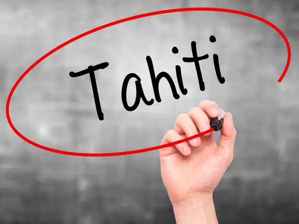 Ręką człowieka pisania Tahiti z czarnym markerem na wizualne ekranie — Zdjęcie stockowe