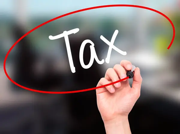 Man Hand writing Tax with black marker on visual screen — Stock Photo, Image