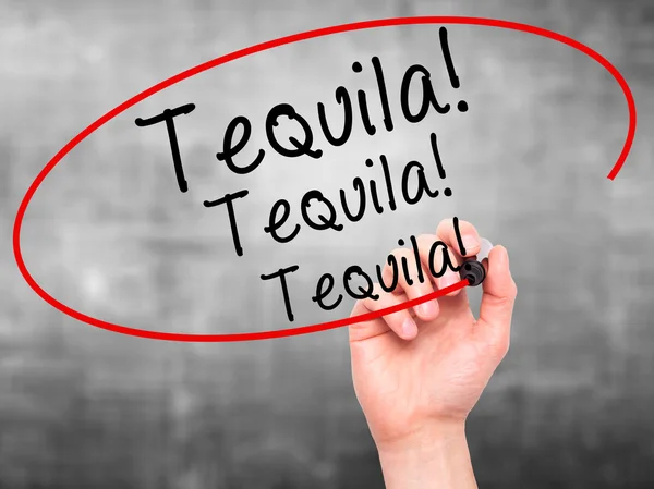 Man Hand writing Tequila with black marker on visual screen — Stock Photo, Image