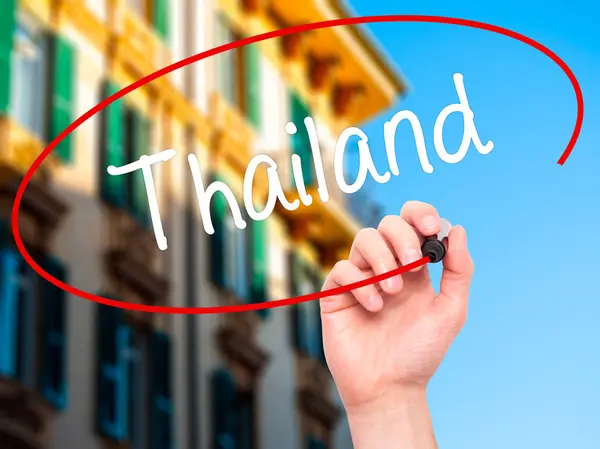 Ręka człowieka pisania Tajlandia z czarnym markerem na wizualne ekranie — Zdjęcie stockowe