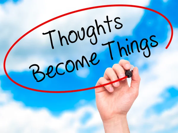 Man Hand, Thoughts Become Things schrijven met zwarte marker op vis — Stockfoto