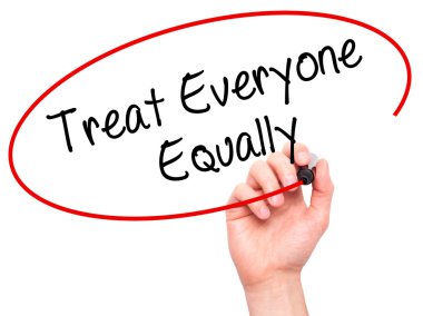 Man Hand writing Treat Everyone Equally with black marker on vis