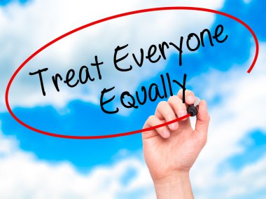 Man Hand writing Treat Everyone Equally with black marker on vis