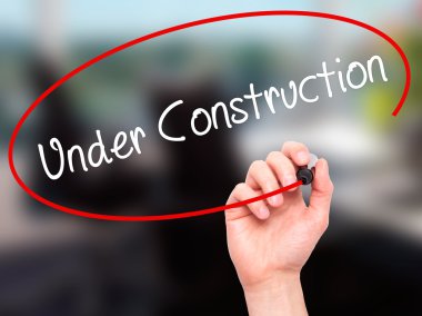 Adam el yapım aşamasında siyah kalemi ile görsel üzerinde yazılı. 