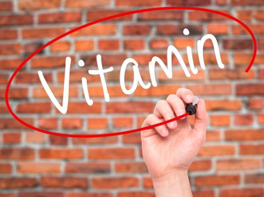 Adam el vitamini ile siyah kalemi görsel ekranda yazma.