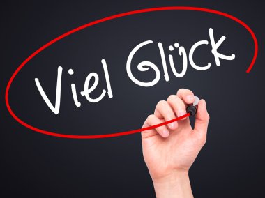 Adam el ile siyah Ma viel Gluck (Almanca iyi şanslar) yazma