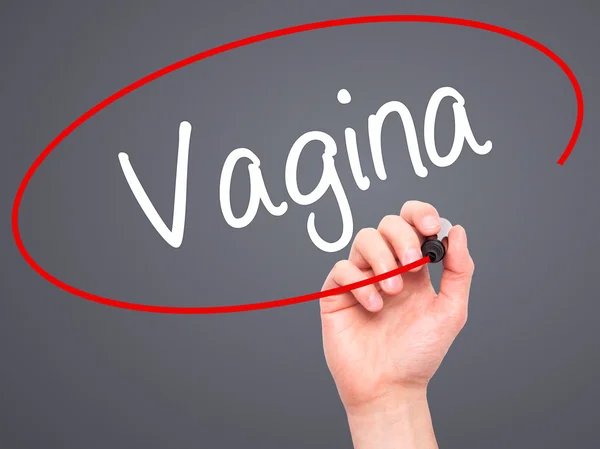 Man Hand writing Vagina with black marker on visual screen — Stockfoto