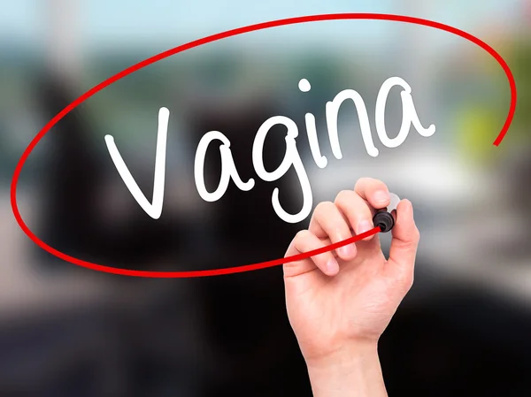 Man Hand writing Vagina with black marker on visual screen — Stockfoto