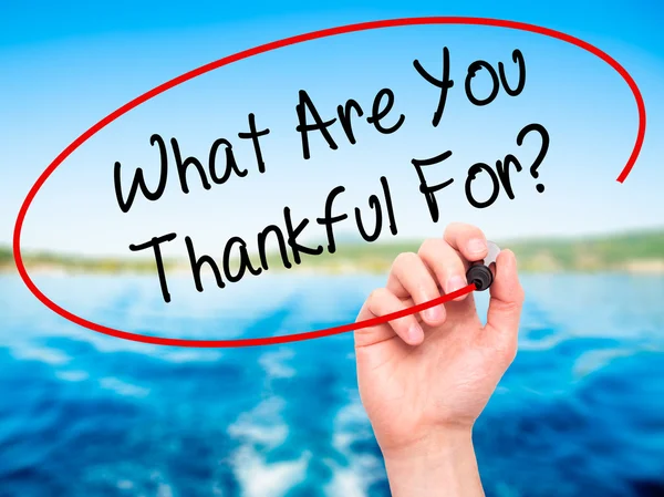 Man Hand writing What Are You Thankful For? with black marker on — Stock Photo, Image