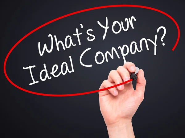 Man Hand skriva vad din idealiska företaget? med svart markering på — Stockfoto