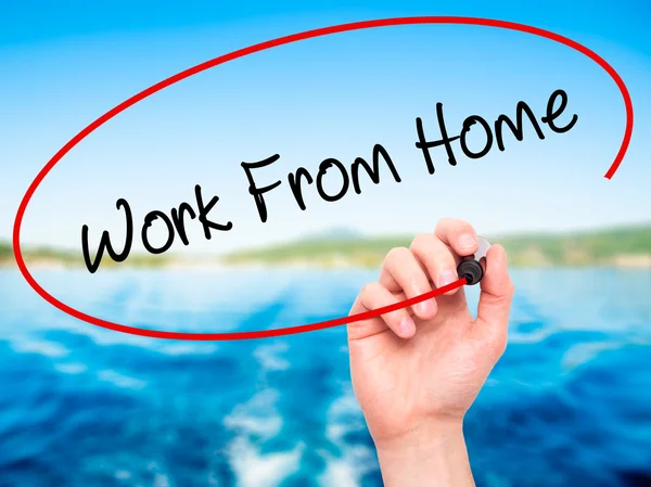 Adam el ile siyah kalemi görsel scre Work From Home yazma