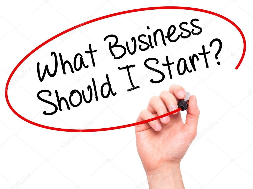 Man Hand writing What Business Should I Start? with black marker