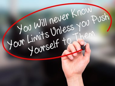 Man Hand writing You Will never Know Your Limits Unless you Push