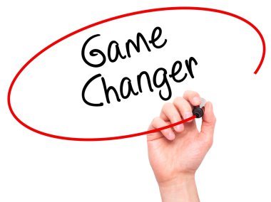 Man Hand writing Game Changer with marker on transparent wipe bo